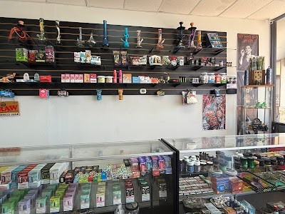 Well-stocked cigarette shop in Houston with shelves of tobacco products and accessories, ideal for smokers' needs.