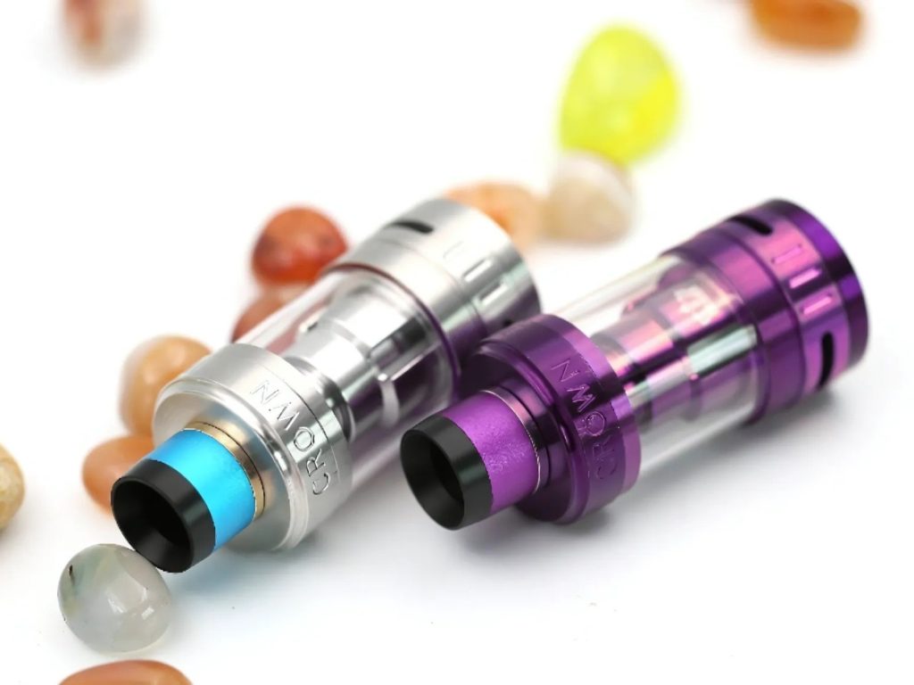 A selection of sleek vape devices with colorful designs, offered by a vape shop Houston.