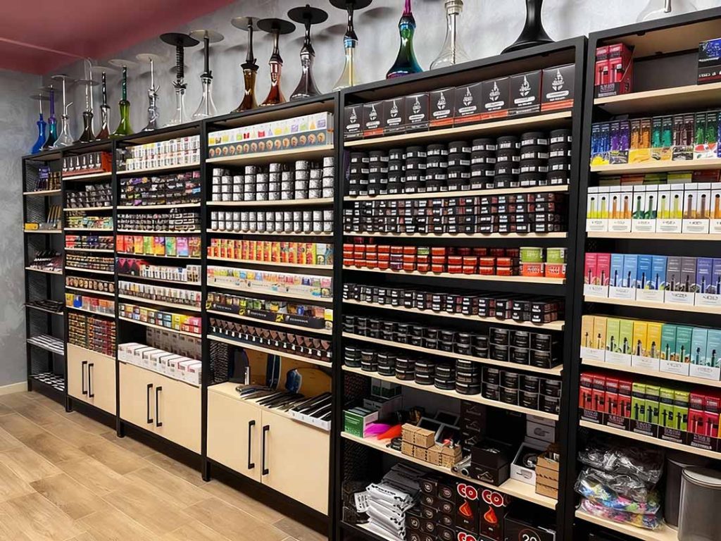 Modern Head Shop Houston interior with premium hookahs, glass pipes & accessories on display.