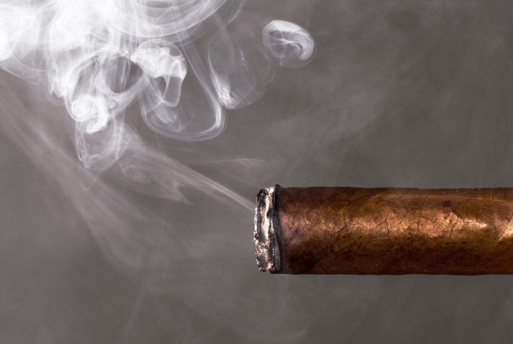 Box of Padrón 1926 Serie cigars displayed in a shop window; find luxury brands at this cigar shop Houston.